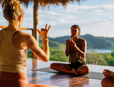 Meditation class in a ocean and jungle view yoga shala