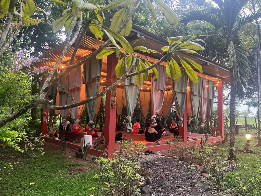 Yoga shala in tropical bungalow from Shaya yoga retreat center, which is an affordable Wellness retreat